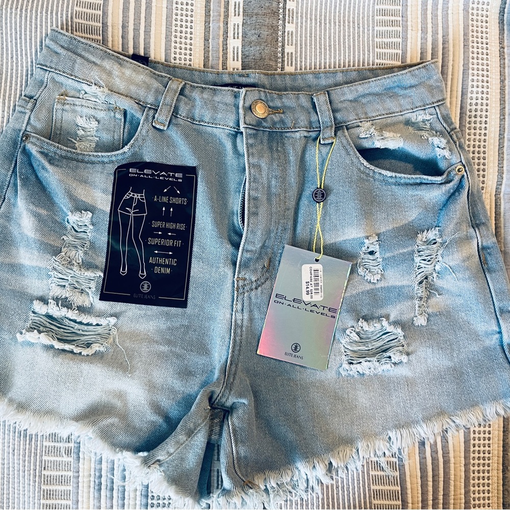 Juniors size 9 NWT light blue Denim Distressed cutoff Shorts